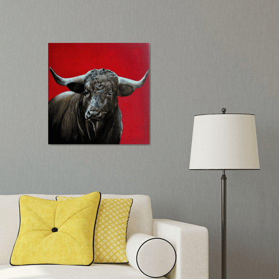 Brave bull on red