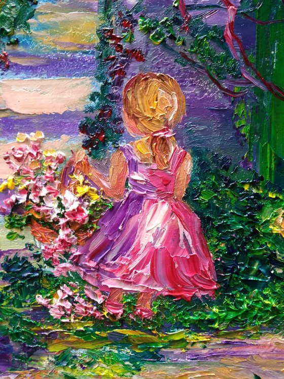 Girl picking flowers in the garden