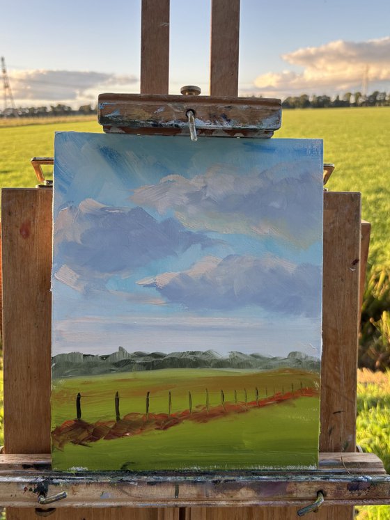 Clouds over the field