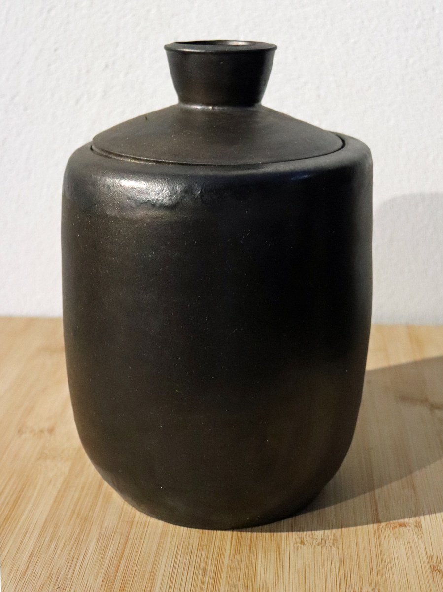 Large bronze vessel with lit by Koen Lybaert