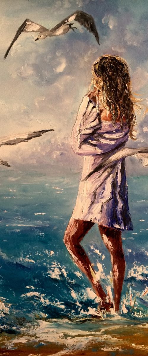 Girl with the seagulls at the beach by Inna Montano