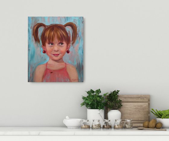 Girl with ponytails, ladybug and cherry earrings portrait