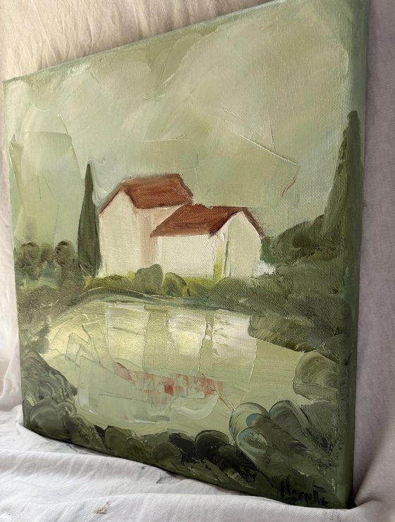 Toscana hills white houses with lake.