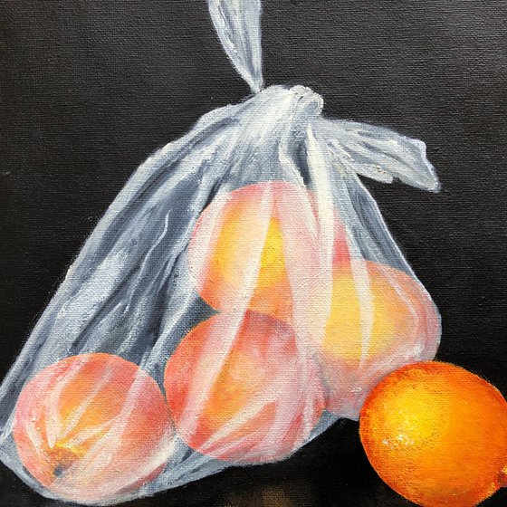 Oranges in plastic bag