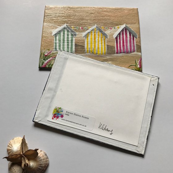 Stripey beach huts (diptych)