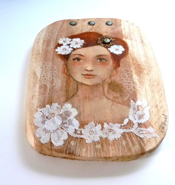 Tender Emilia on wood.