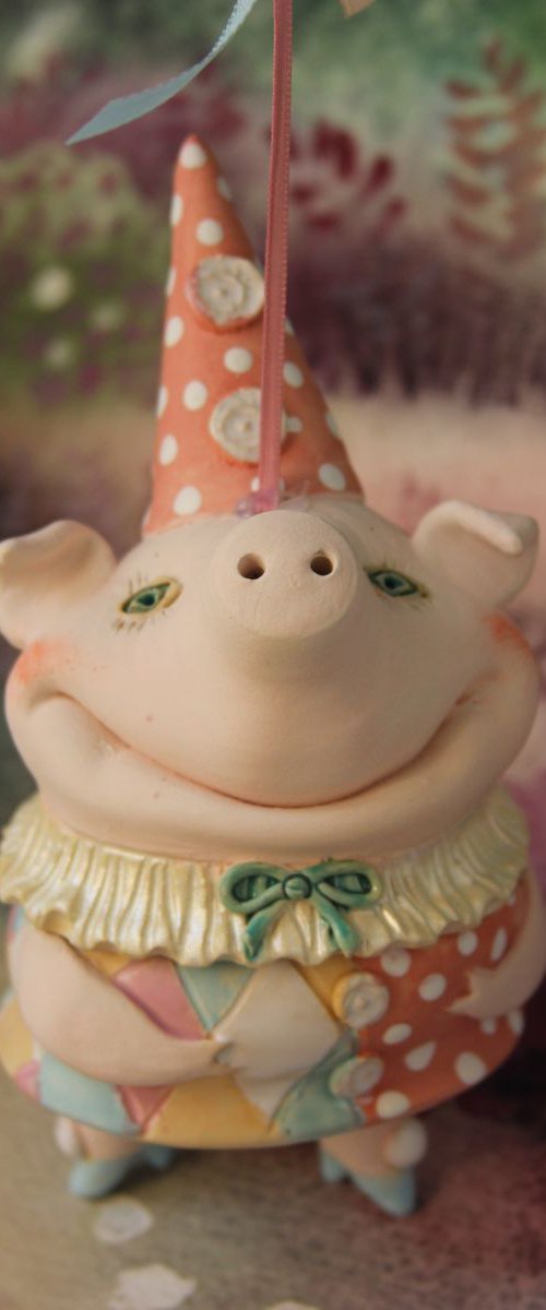 Little piggy in harlequin dress. Hanging sculpture, bell doll by Elya Yalonetski by Elya Yalonetski