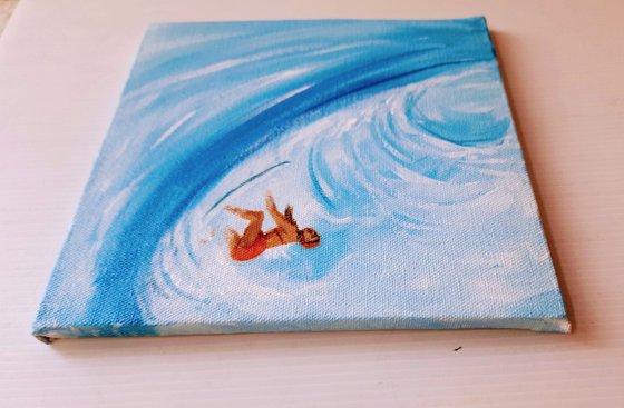 Set of Two Surfers in the blue sea