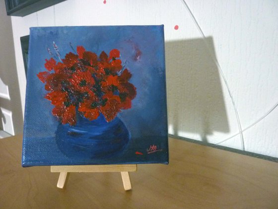 A Blue Bowl of Red Poppies