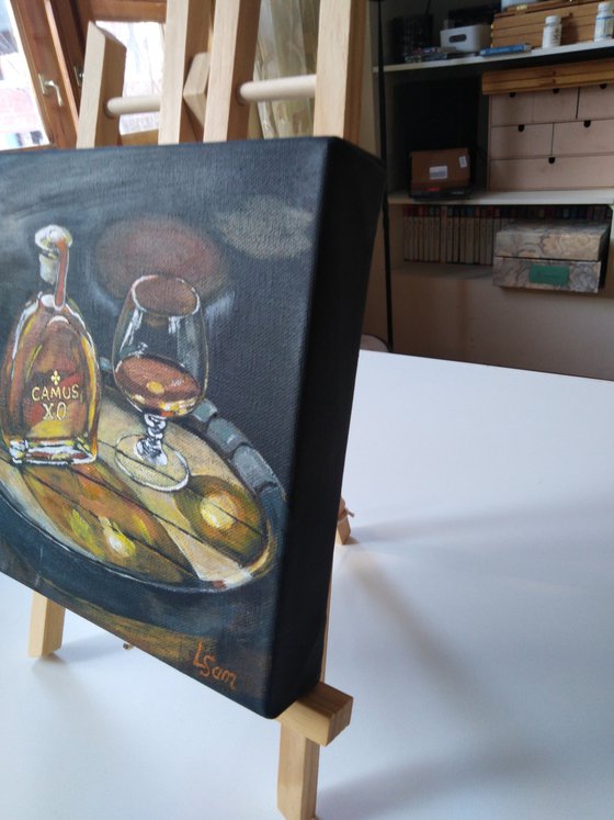 A man's still life with cognac