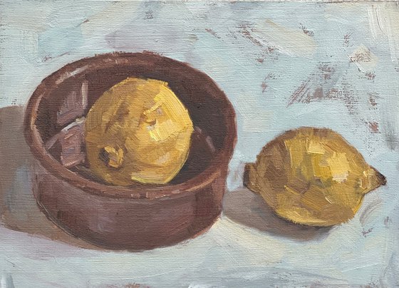Lemons and a pot