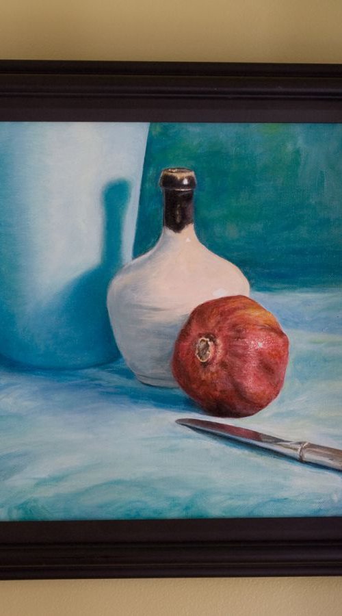 Pomegranate and knife by John Fleck