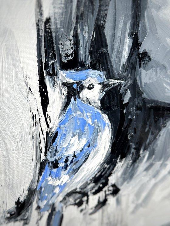 Portrait of a girl with a blue jay