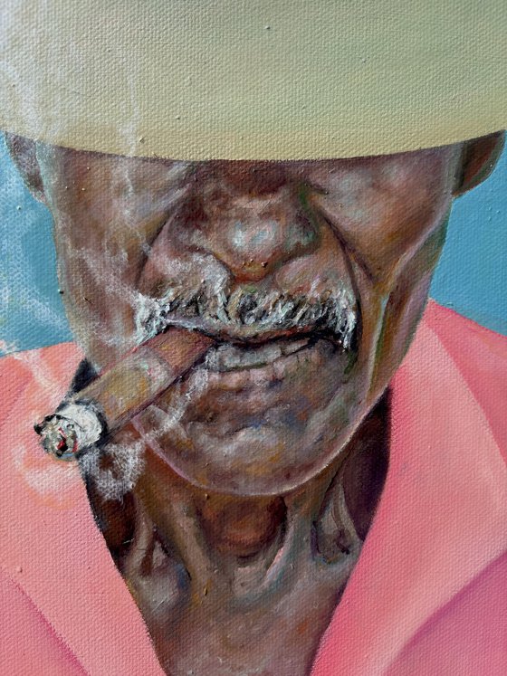 Smoking man in a hat