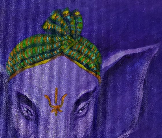 Purple Ganesha in green silk