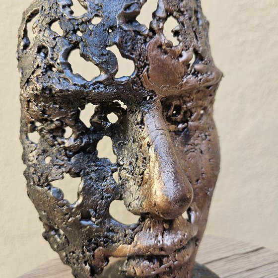 A tear 58-23 - Face sculpture metal lace steel and bronze