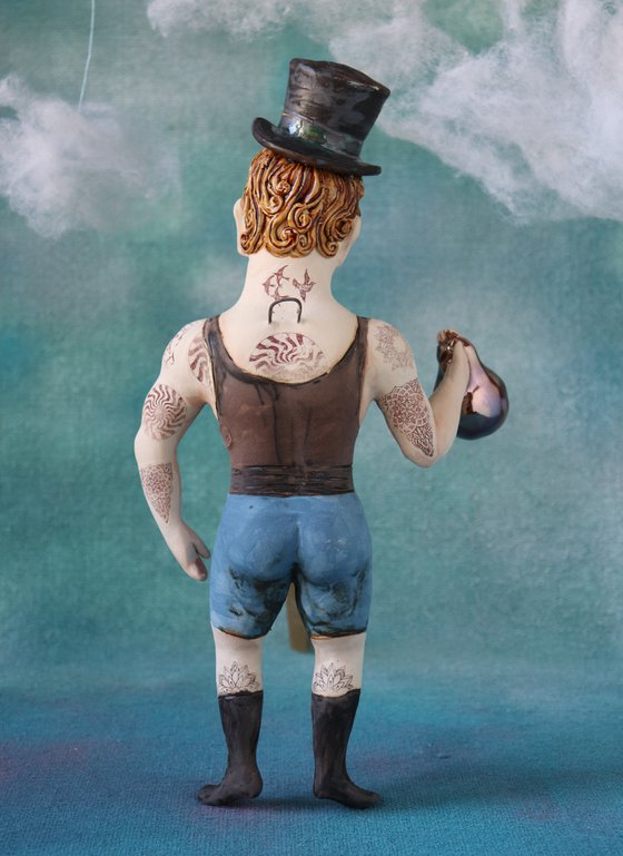 Vintage Strongman with zylinder hut. Wall sculpture by Elya Yalonetski.