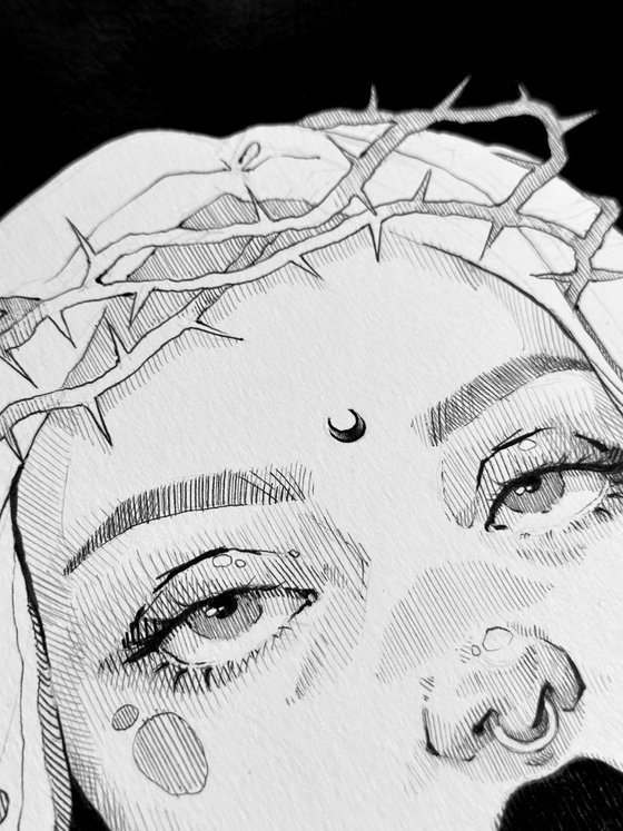 Girl in a crown of thorns