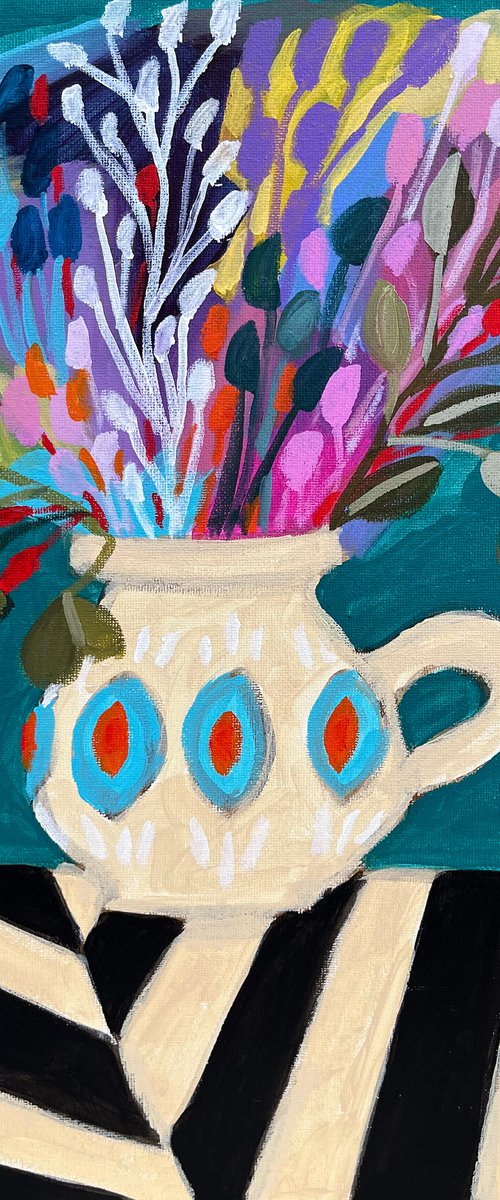 Flowers in vase on striped tablecloth by LENKA STASTNA