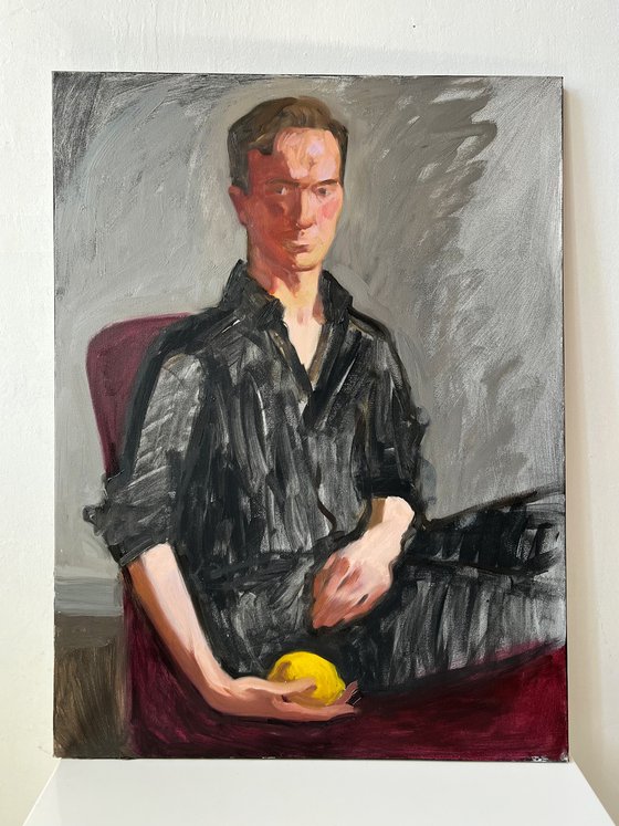 Portrait of a man with lemon