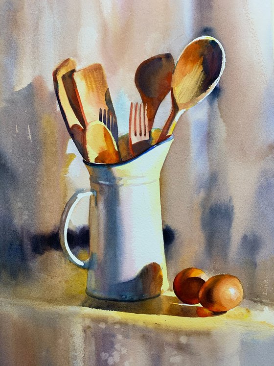 Jug with wooden spoons