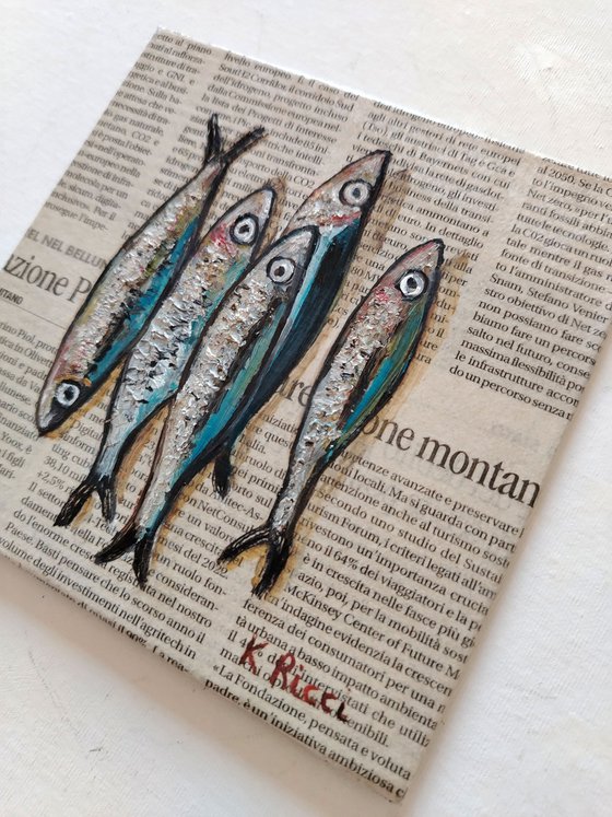 Small Fishes on Newspaper