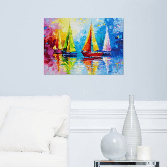 Sailboats in the rainbow dawn