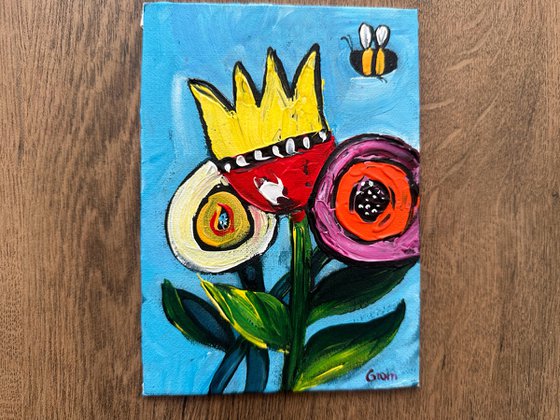Cartoon flowers and bee