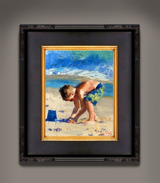 Boy Playing Sand in Beach