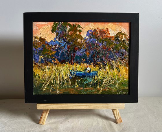 On a boat among the reeds