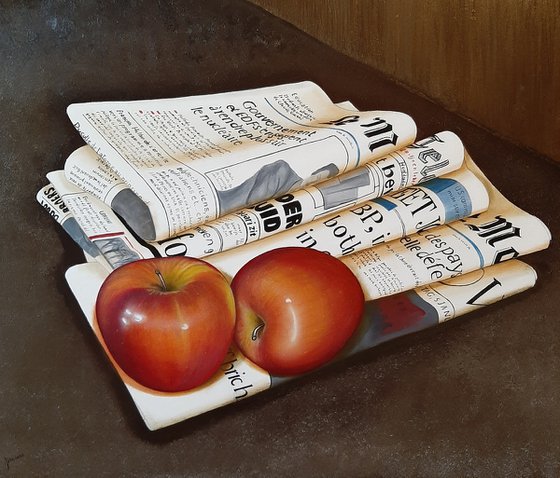 Newspaper with apples