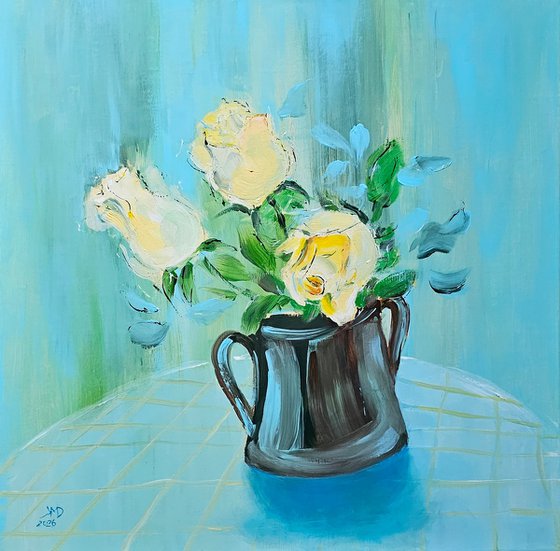 Blooming yellow roses on blue