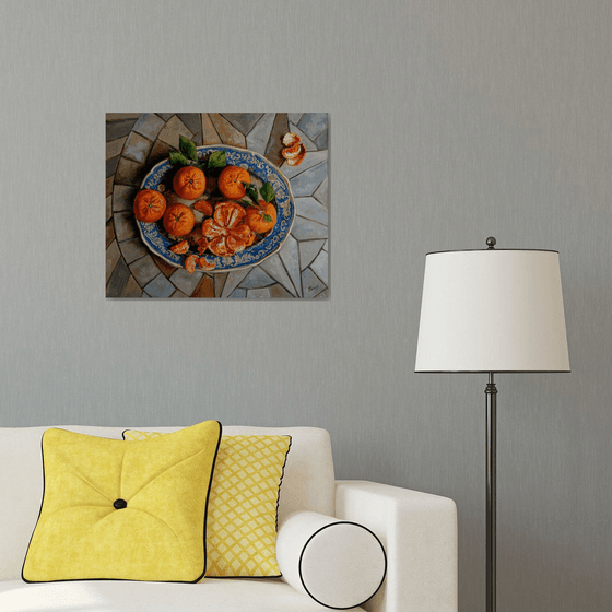 Tangerines on a blue plate