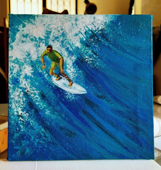Surfer in the blue sea 4