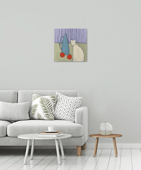 Still life and a white cat.