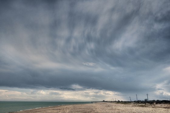 Whirling clouds over the bay.