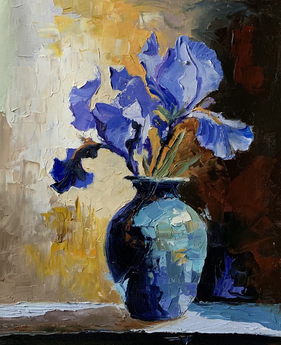 Blue Purple irises in a vase.