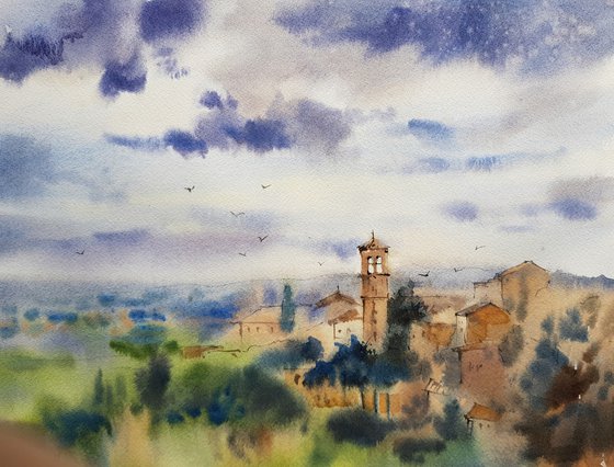 Italian landscape with a view of the bell tower. "Before the rain" Assisi. Italy