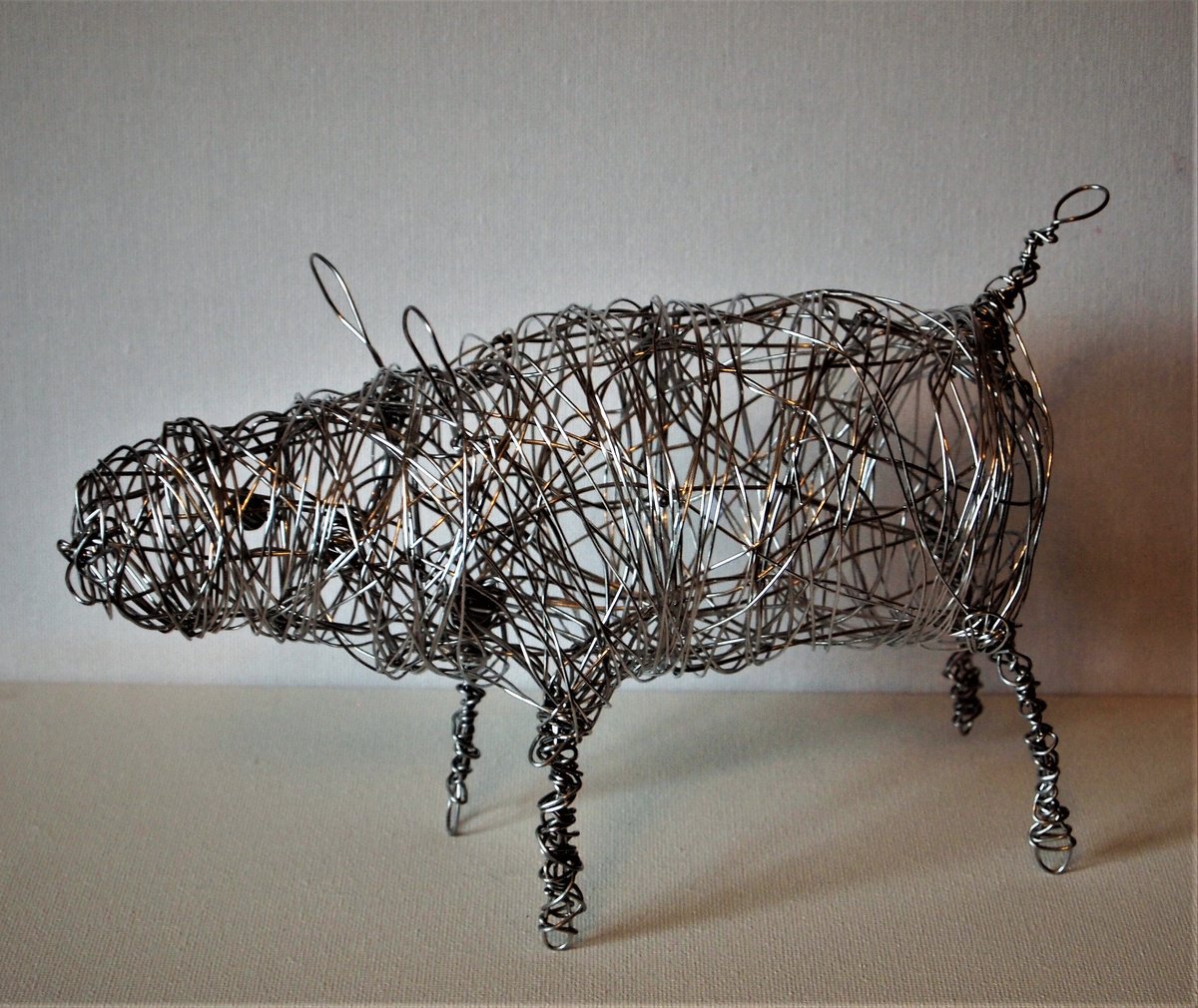 Silver wire Percy Pig sculpture by Steph Morgan