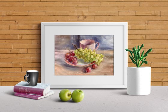 Still life with grapes on a plate and a cup on the table