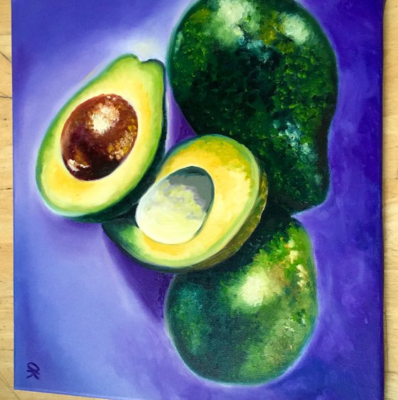 Avocado . Purple, green, photorealistic still life.