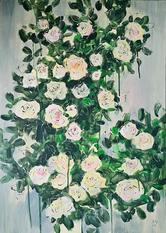 Blooming abstract rose garden in pale yellow