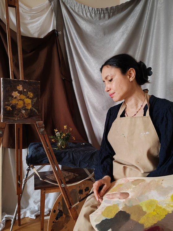 Still life with daffodils and dandelions