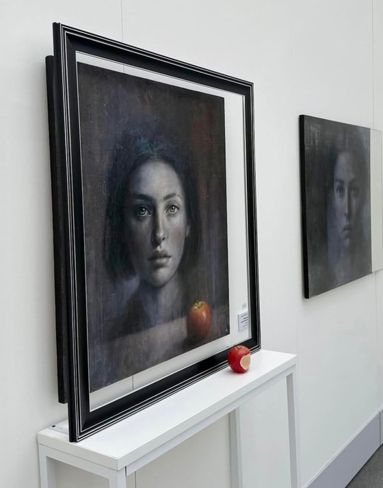 A woman and a bitten apple