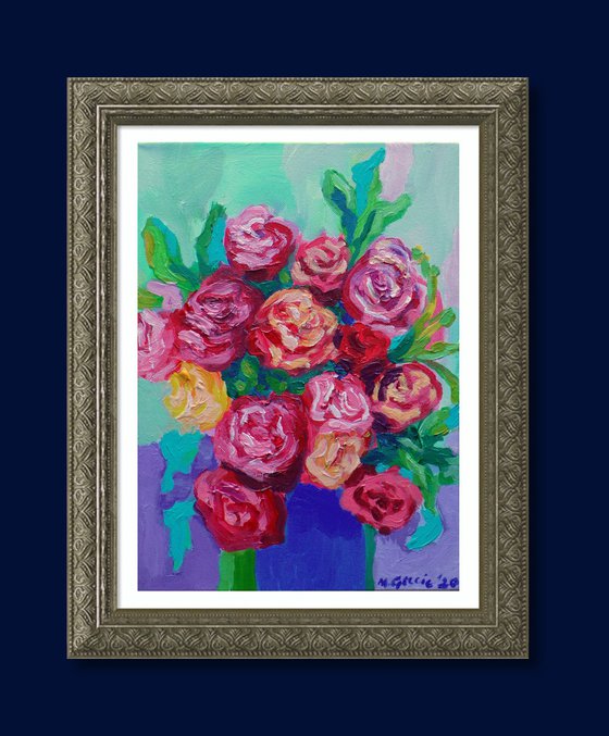 Roses in a blue vase