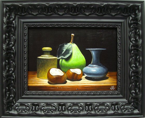 Green pear with conkers