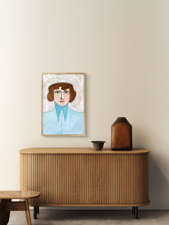 The woman with the high collared blue shirt