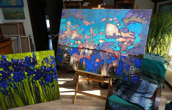 Mirror of water, boats in the clouds