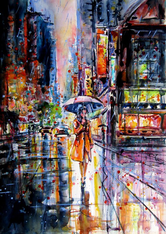Woman walking in the rain