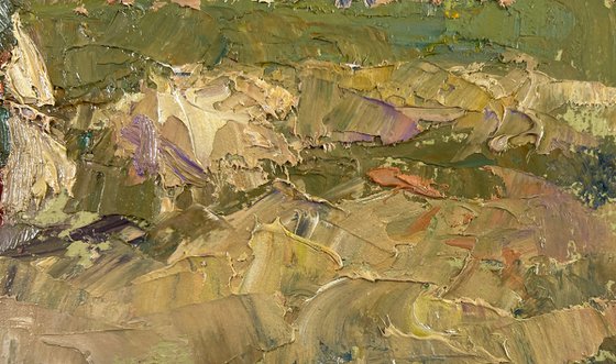 Working in the Field under a Blue Clear Sky